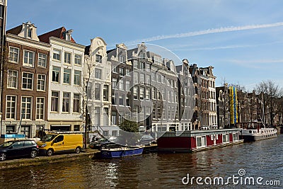 Historic residential buildings along Prinsengracht canal in Amsterdam Editorial Stock Photo